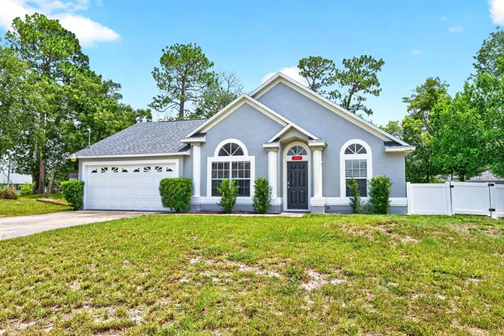 Fresh updates, a NEWER ROOF (2022), and a sprawling .41 ACRE ~ FULLY FENCED LOT with NO HOA make this Deltona Lakes home an opportunity you won't want to miss!