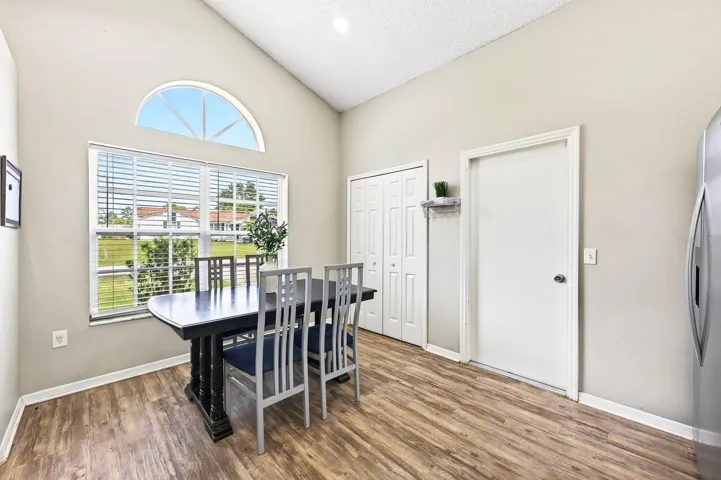 The large picture window pulls in the natural light.