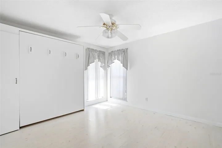 Guest suite offers a convenient murphy bead creating the perfect guest room or office space~