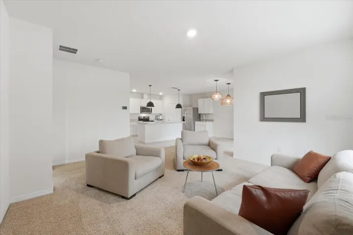 Living Room/Dining Room combo, open concept perfect for entertaining.