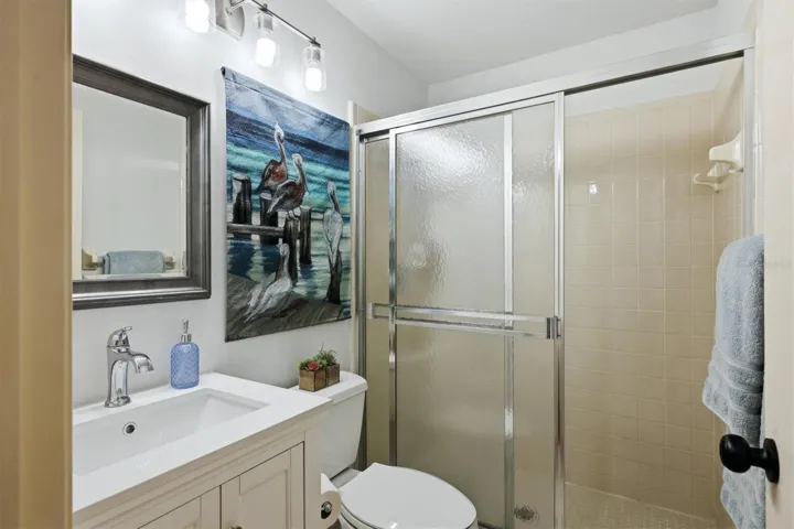 Third full bathroom off the foyer and main living area