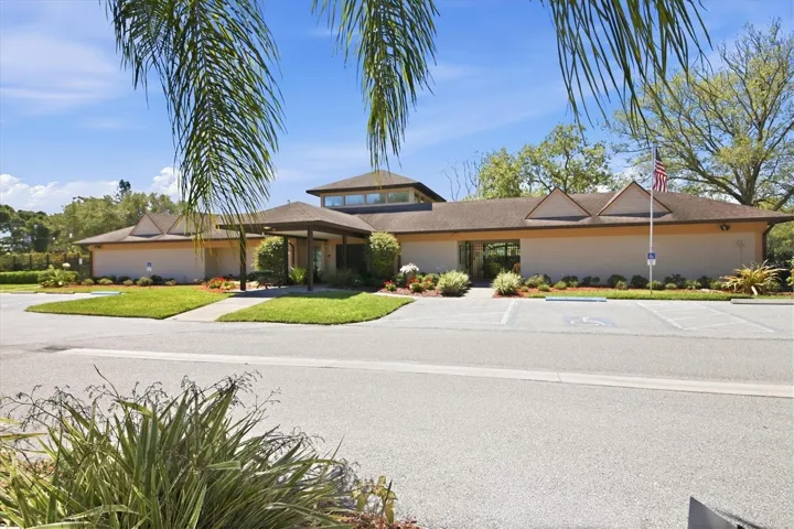 Club house offering enetertainment room with kitchen, library, pool, hot tub, along with the tennis courts and shuffle board. Convienly locatated walking distince from the driveway aslo providing extra guest parking.