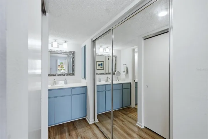 Primary bathroom with dual buit in closets