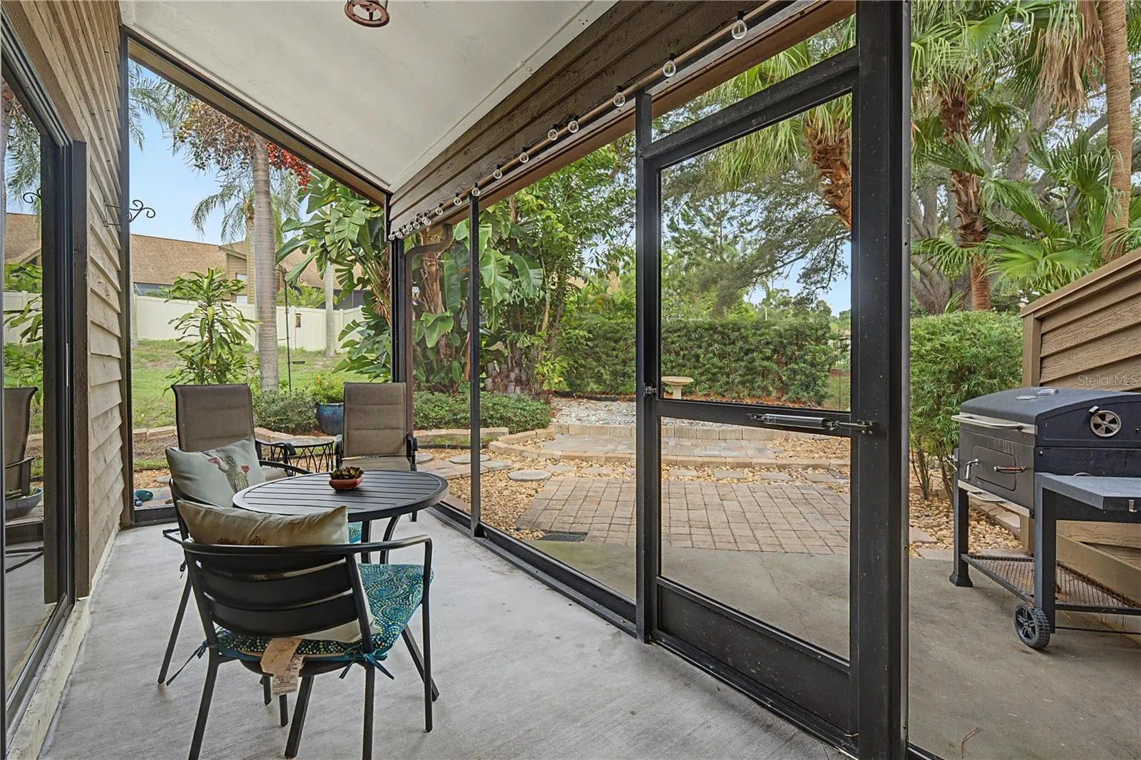 Lovely enclosed screen patio