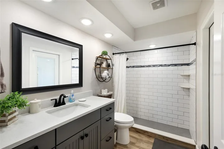Soft close beadboard cabinets and quartz countertop vanity