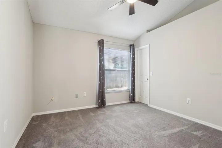 Bedroom 3 has vaulted ceilings and walk in closet