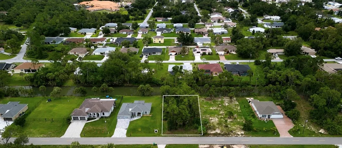 Front view of this freshwater front lot
