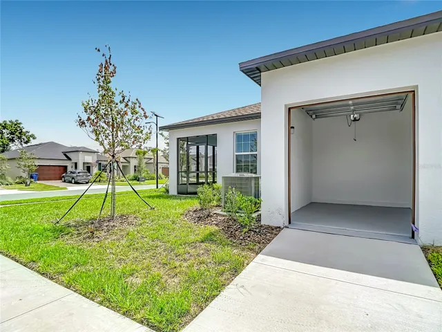 Rear Garage Space for Golf Cart or Additional Storage