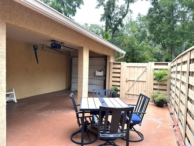 And utilize the carport for either parking or make it into an outside living area where the kids can play or pets can run around.