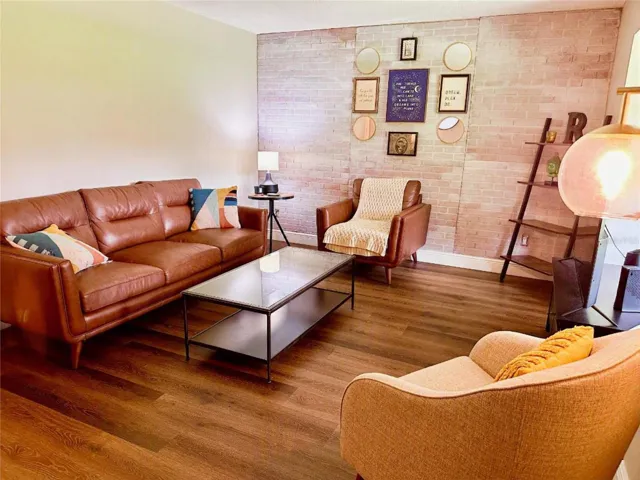 Welcoming living room with updated lvp flooring