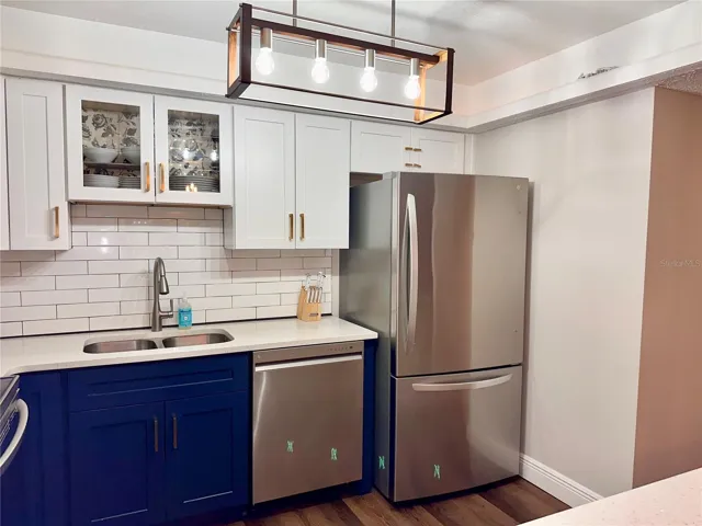 Updated lighting and quartz countertops