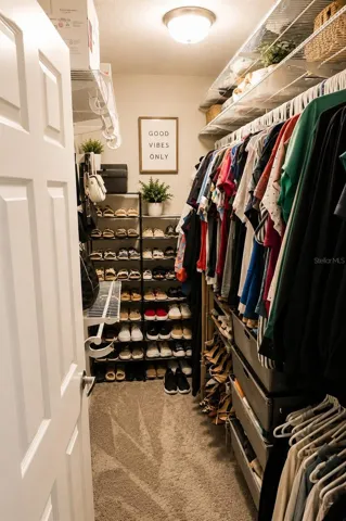 Cozy minimalist closet with stylish touches