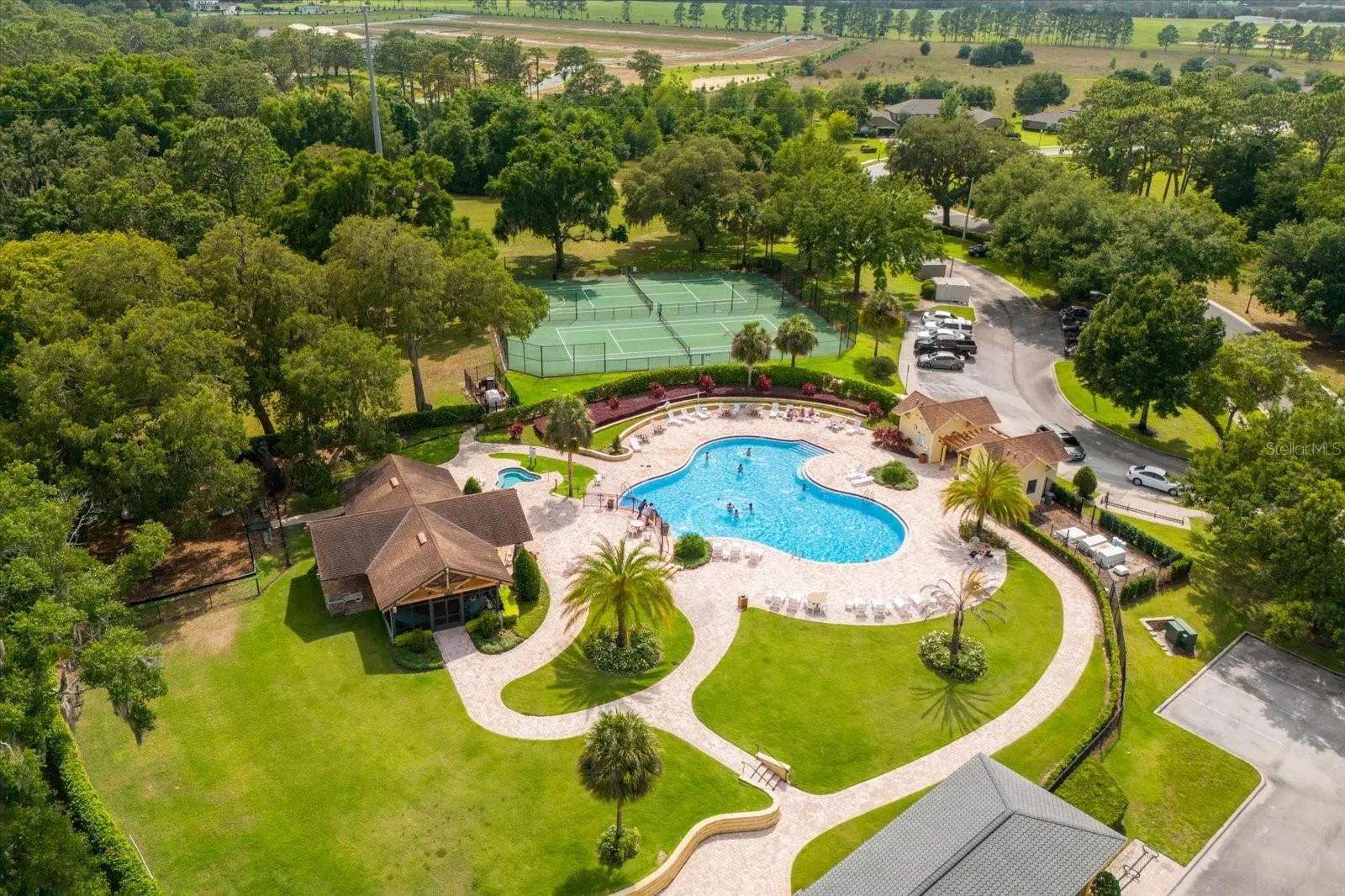 Tennis courts, basketball court, clubhouse and pool