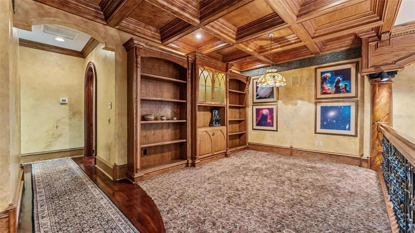 Executive Loft with Coffered Ceiling and Built in storage has the best view in the house!