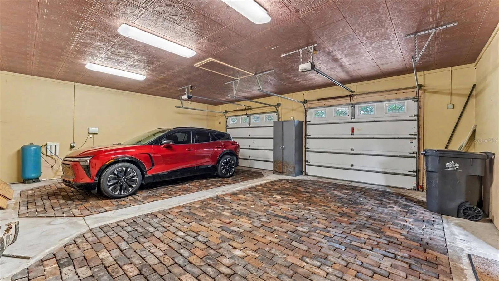 Garage floor is made of authentic Bricks