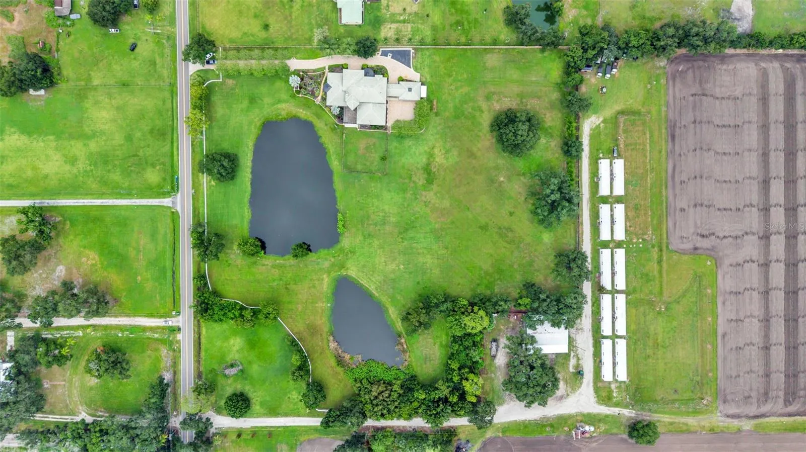 Superb Potential for this almost 8 acre fully fenced Equestrian Estate already zoned for Horses, Training, Boarding, etc.