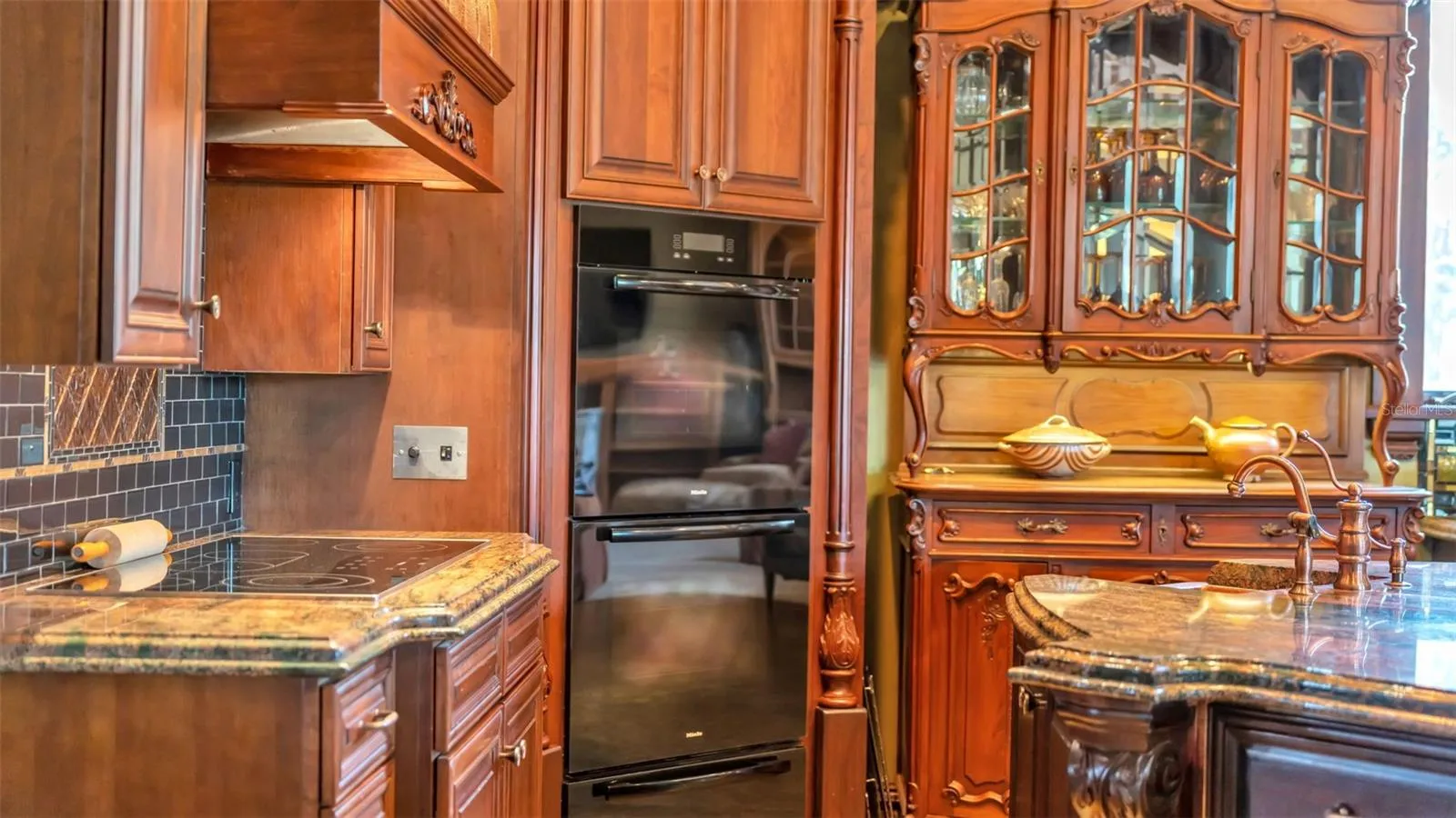 Miele Brand Built in Double Ovens, Glass Flat top Range, Commercial grade GE Monogram-  Refrigerator & Freezer, Double stacked Integrated Beverage, Dishwasher & Microwave Drawers are hidden in plain sight!