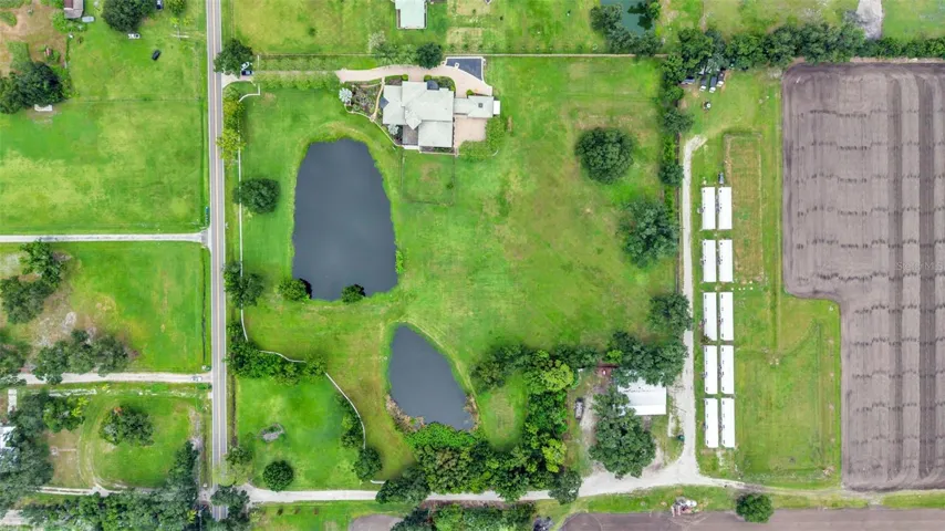 Superb Potential for this almost 8 acre fully fenced Equestrian Estate already zoned for Horses, Training, Boarding, etc.