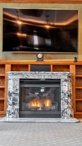 Family room Gas Fireplace Surround is an Imported Italian Marble Mantle