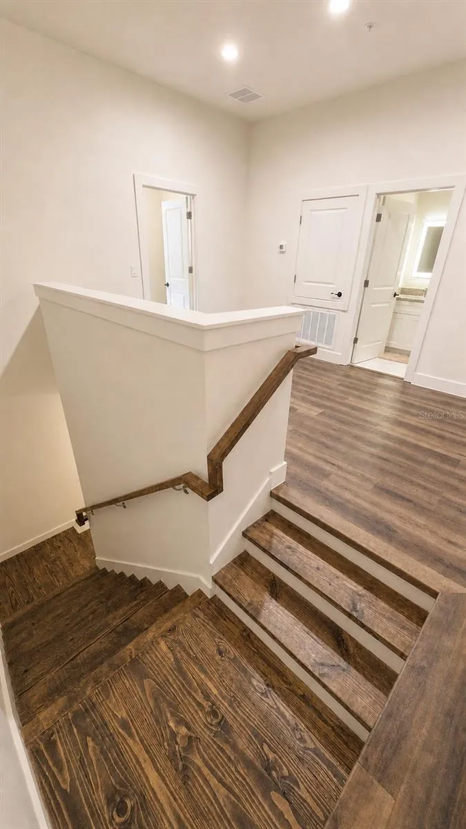 Staircase to upstairs Foyer and Bedrooms