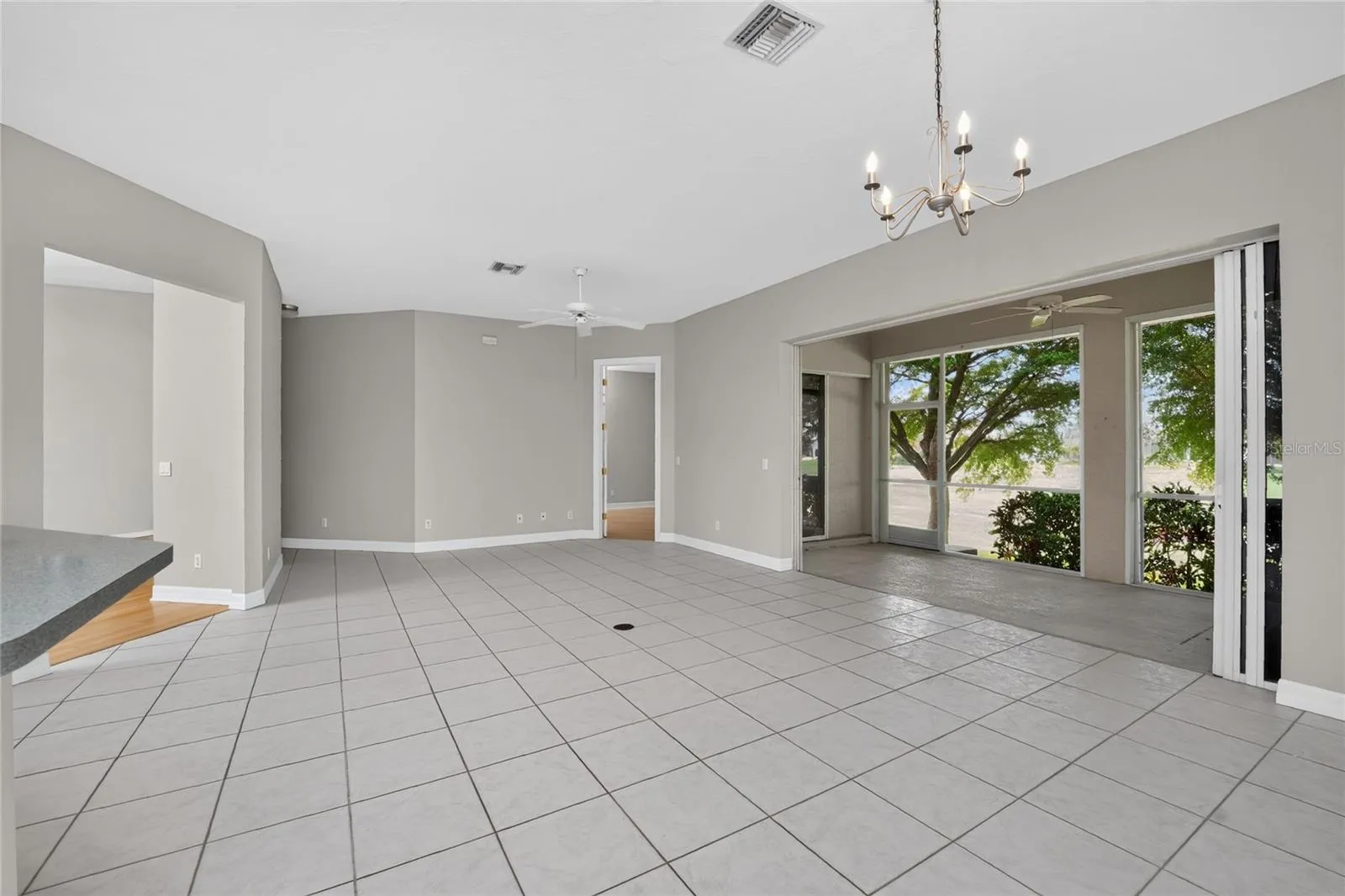 Great room with screened lanai and pocketing patio doors.