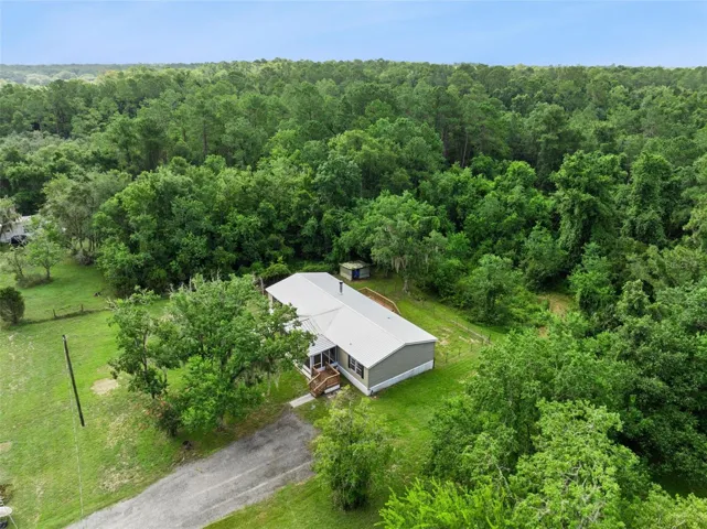 Aerial Side view of house and property