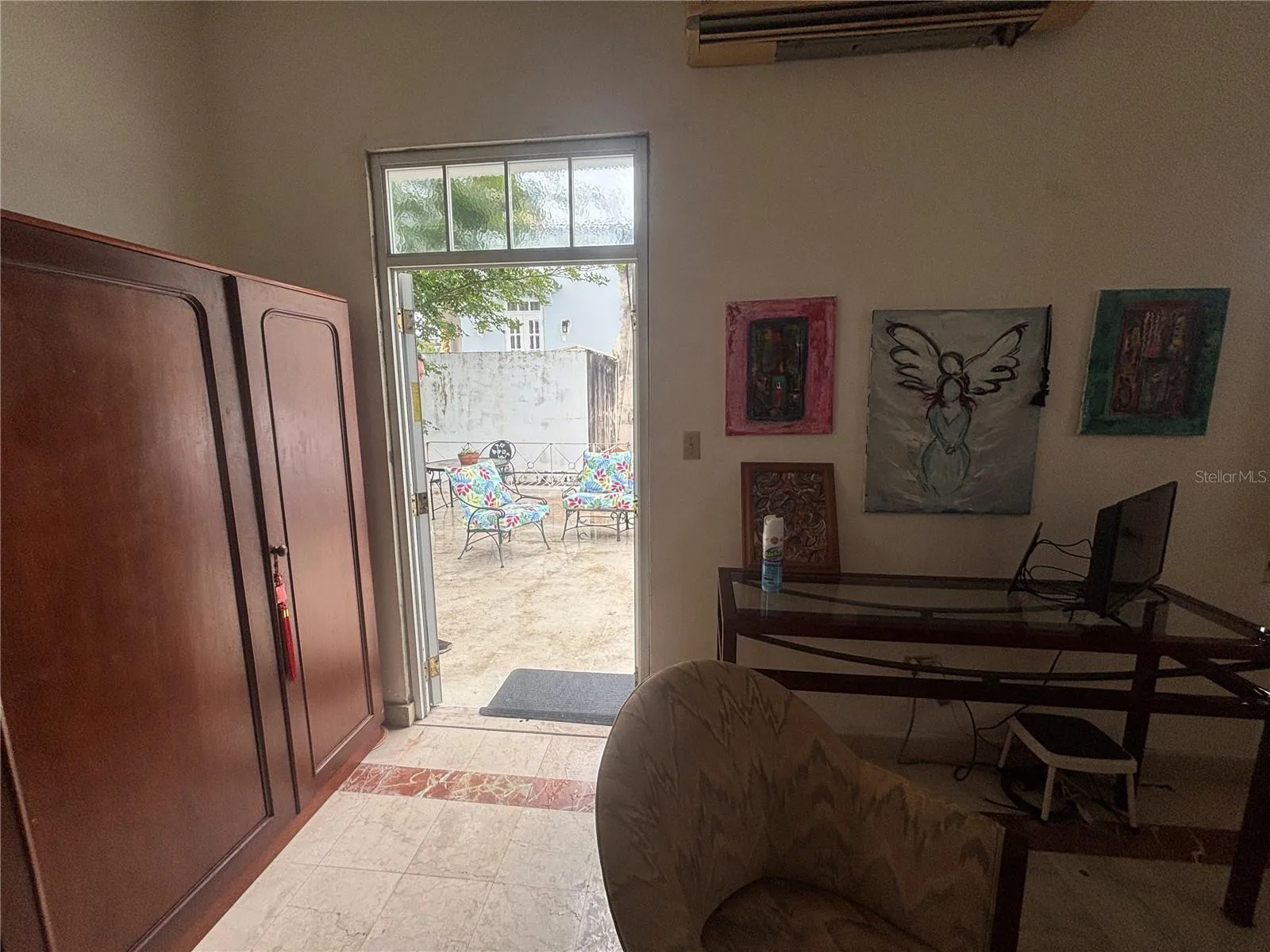 View from the primary bedroom to the upper terrace.
