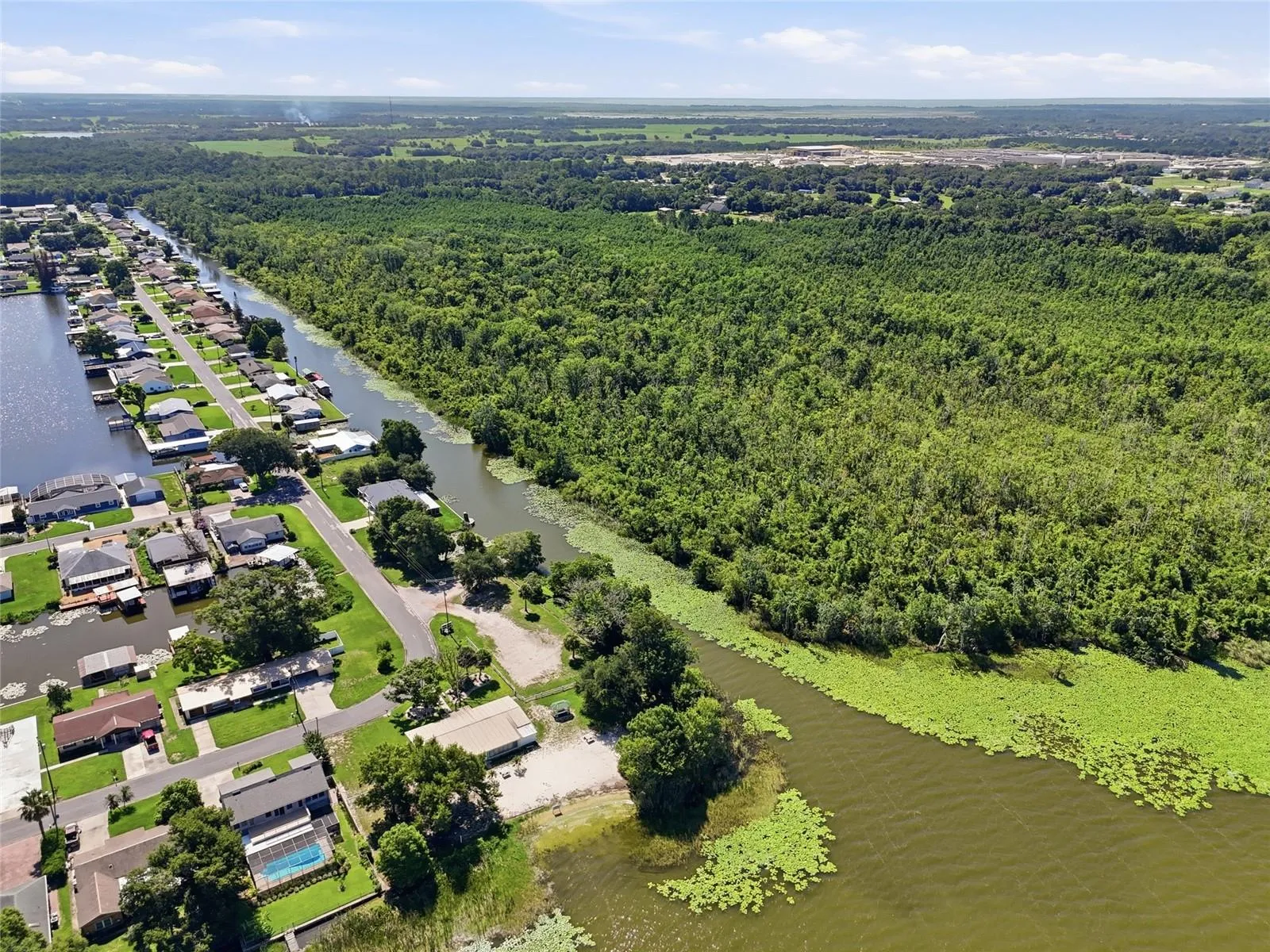 Bass Canal is aprox 13 feet deep and 80 feet wide.