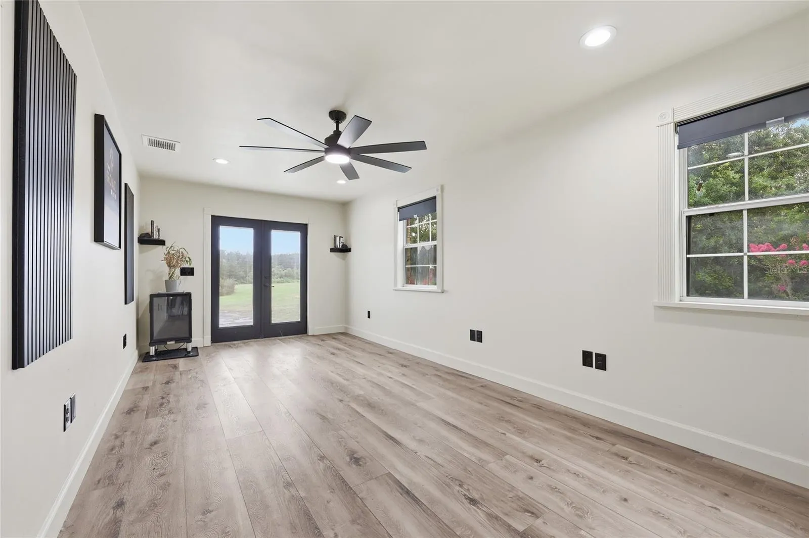Garage Office, New Flooring, window and lights.