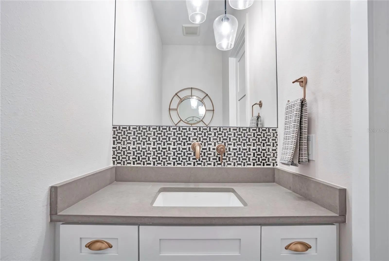 Powder bath off entry way first floor