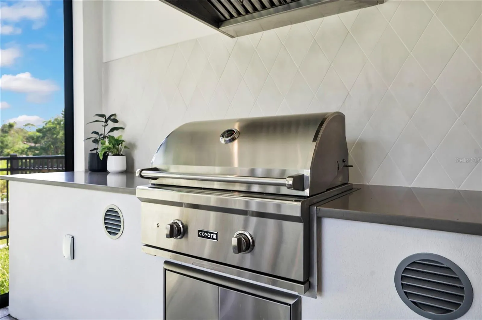 Gas grill in summer kitchen