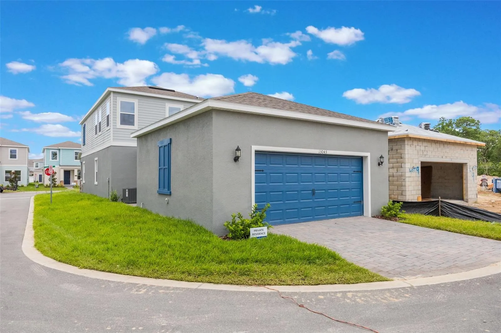 Corner lot detached garage in rear next door home is complete