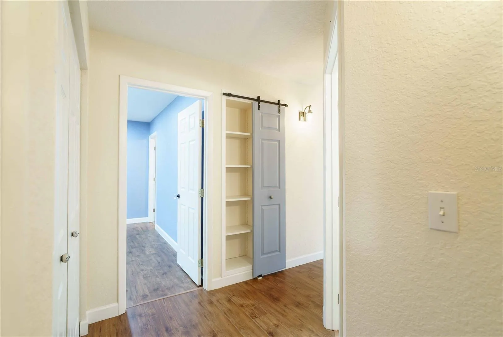 Barn door on linen closet