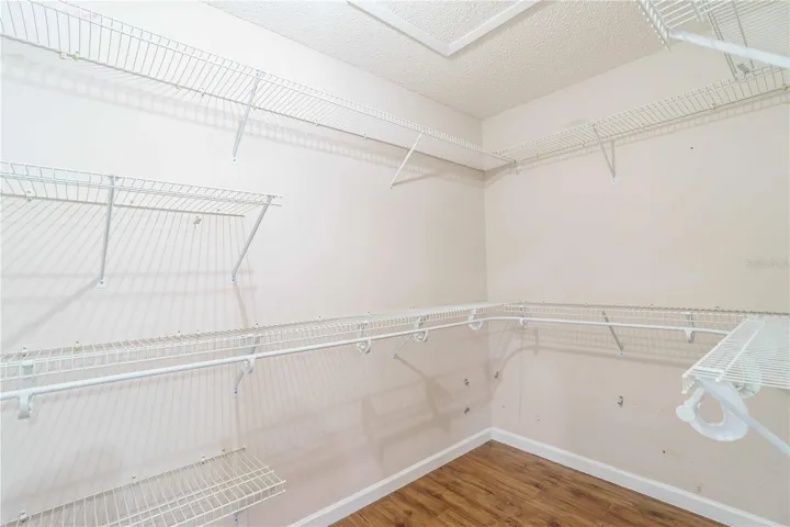 Large walk in closet in primary bedroom