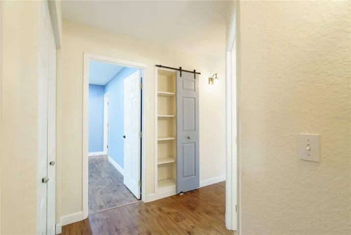 Barn door on linen closet