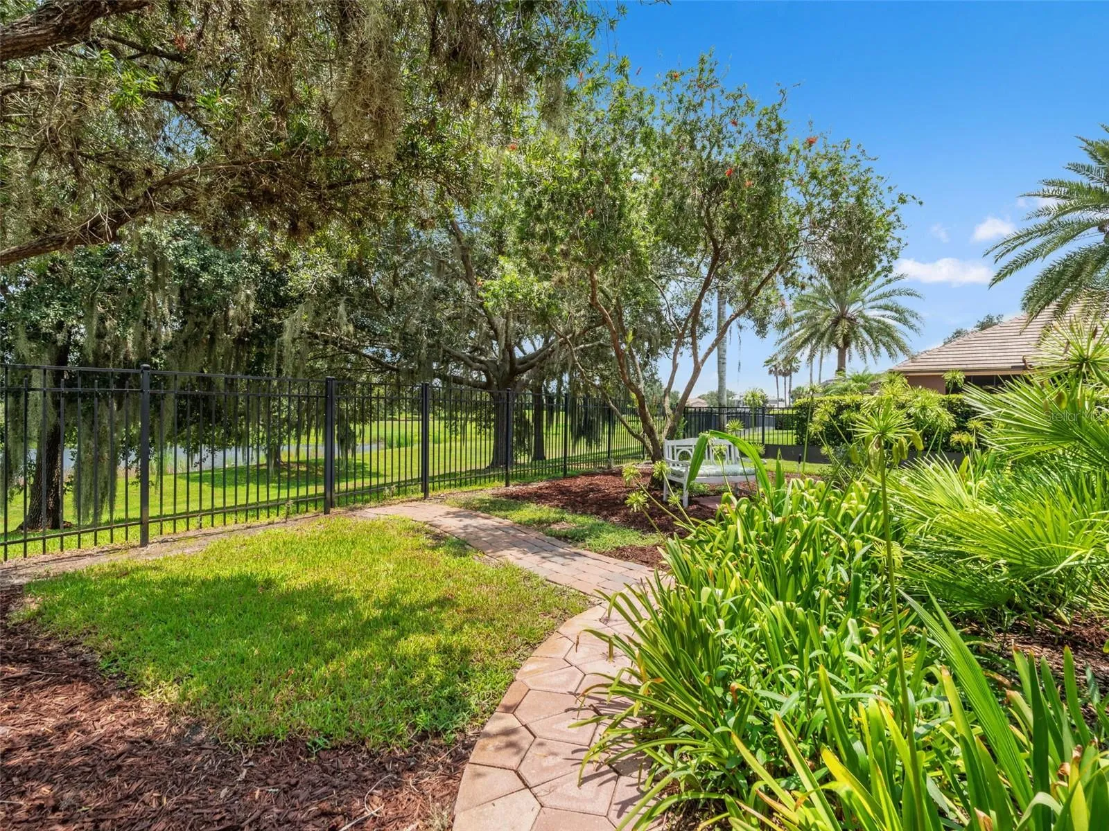 Peaceful garden to the side of the pool