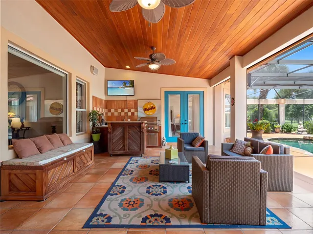Outside sitting area with outdoor kitchen