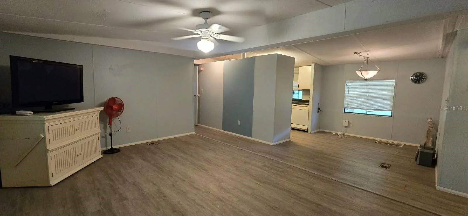 Living room area, viewing into the dining room and kitchen