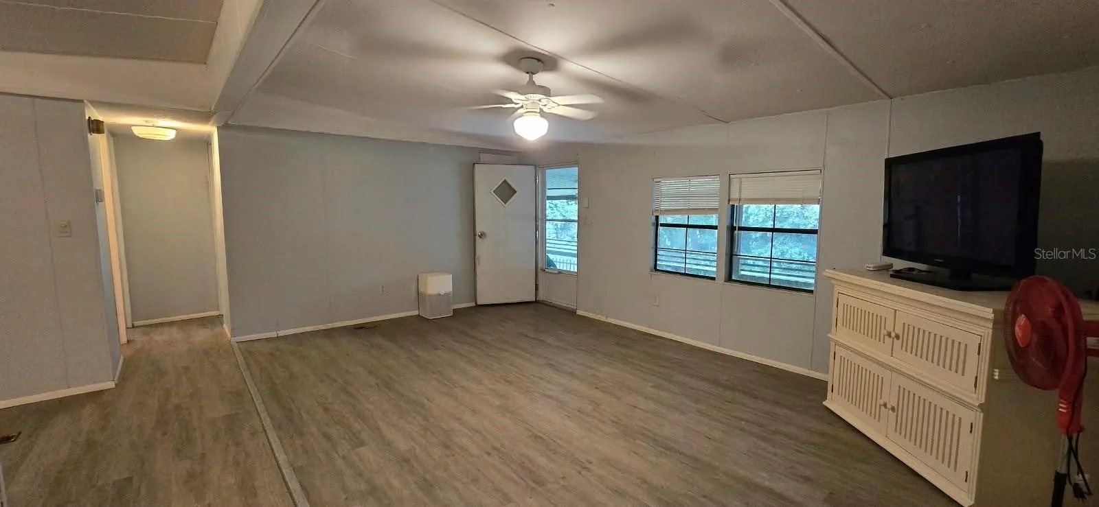 View from hallway to primary bedroom.