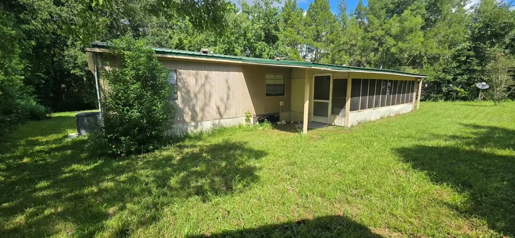 View from back corner of property in front of shed