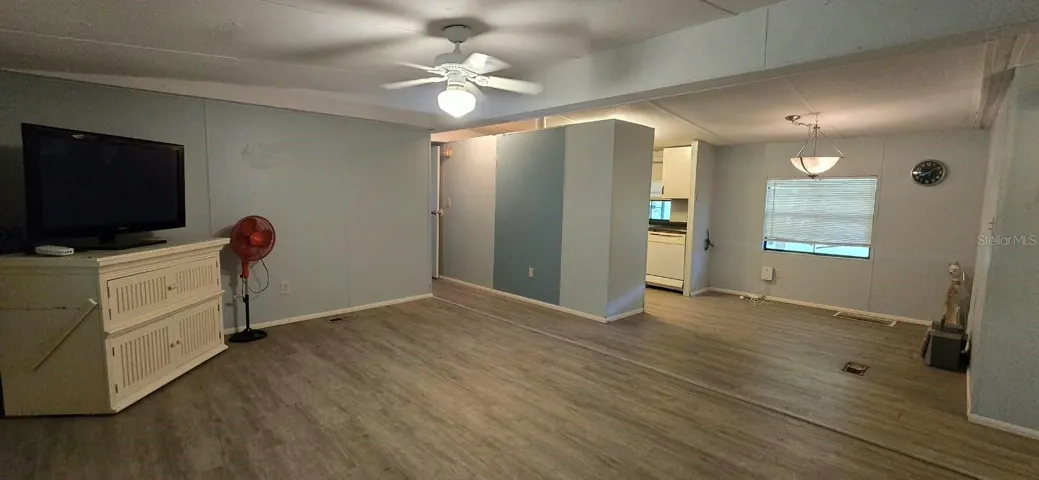 Living room area, viewing into the dining room and kitchen