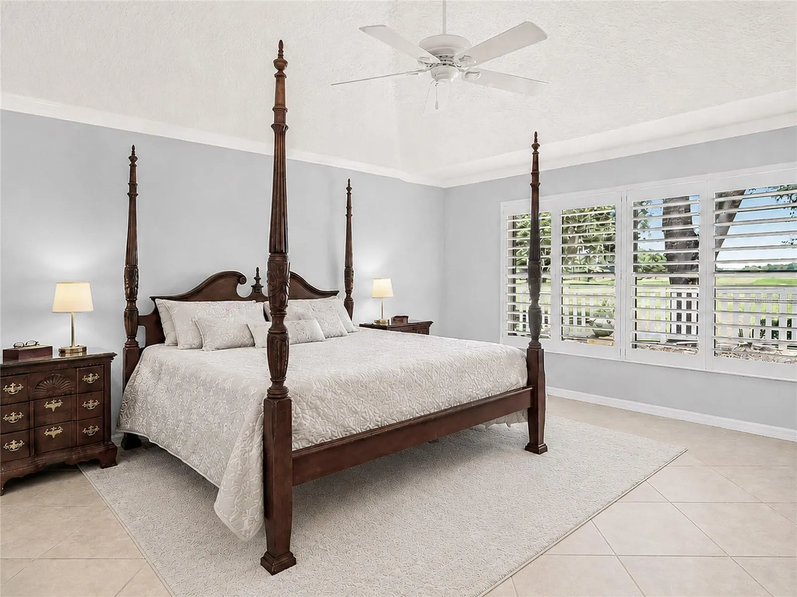 PRIMARY BEDROOM WITH GOLF VIEW