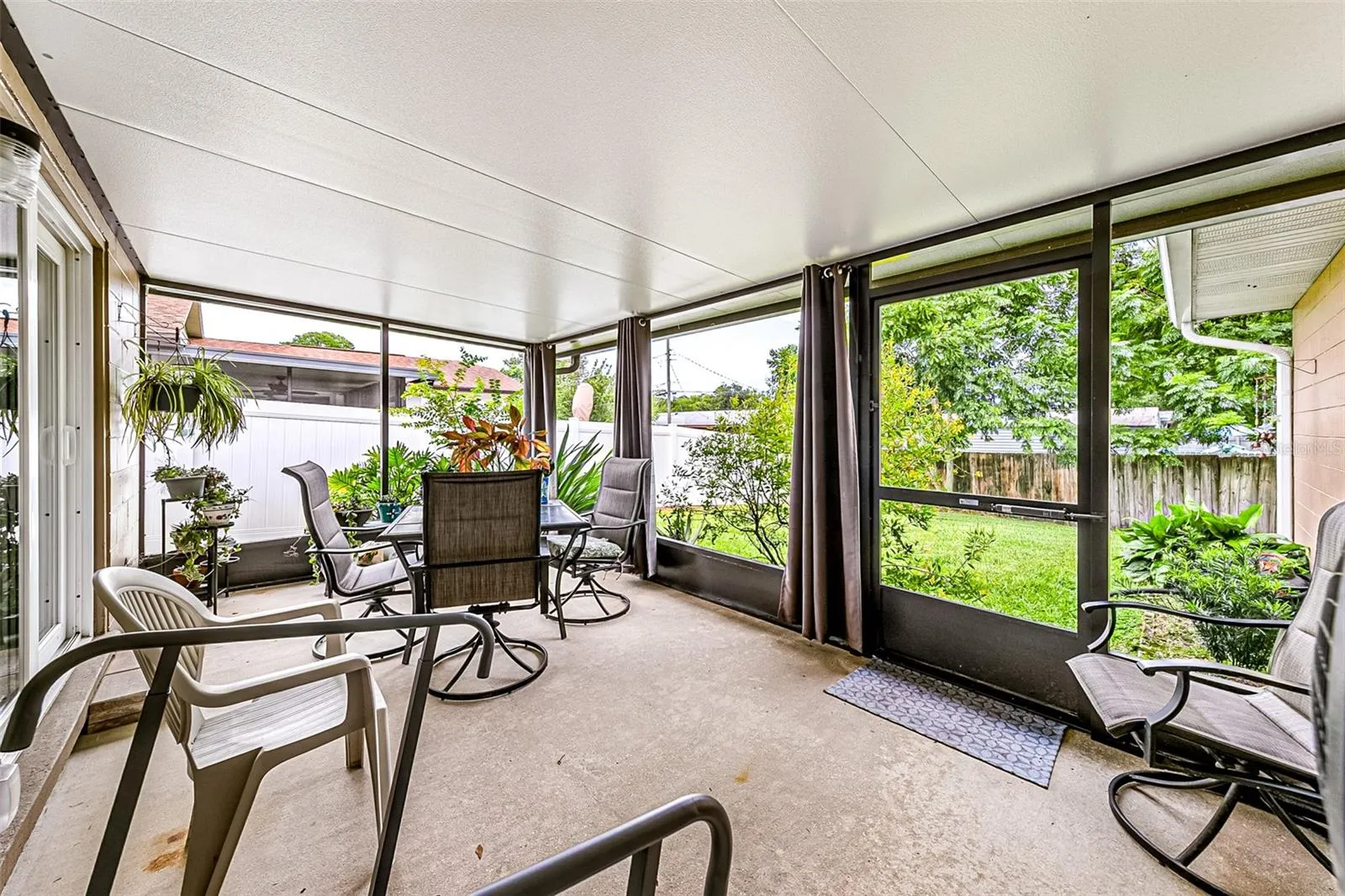 Views to your large yard which is mowed by HOA