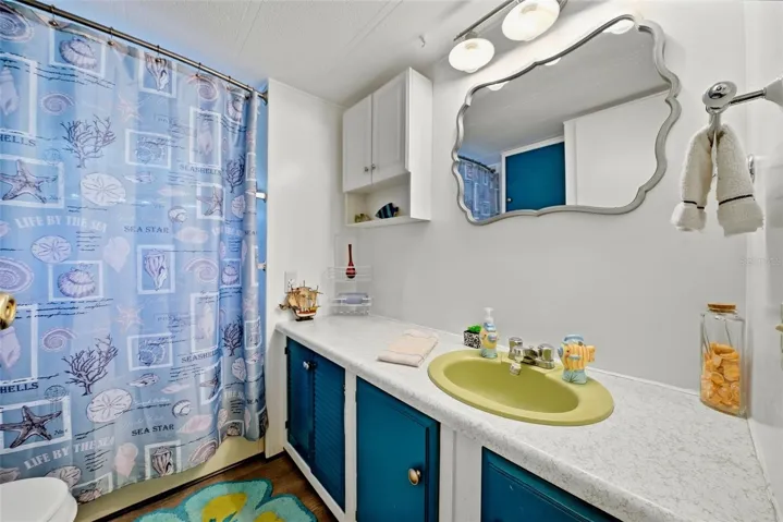 Primary bathroom located just outside primary bedroom