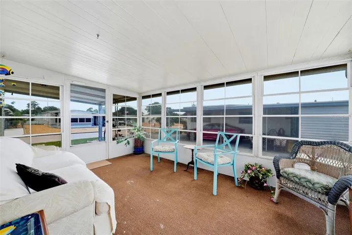 Lanai off the livingroom - add a mini split and this becomes 4 season living space!!