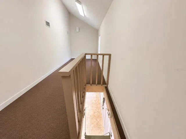 Attic located above laundry- Great storage space!