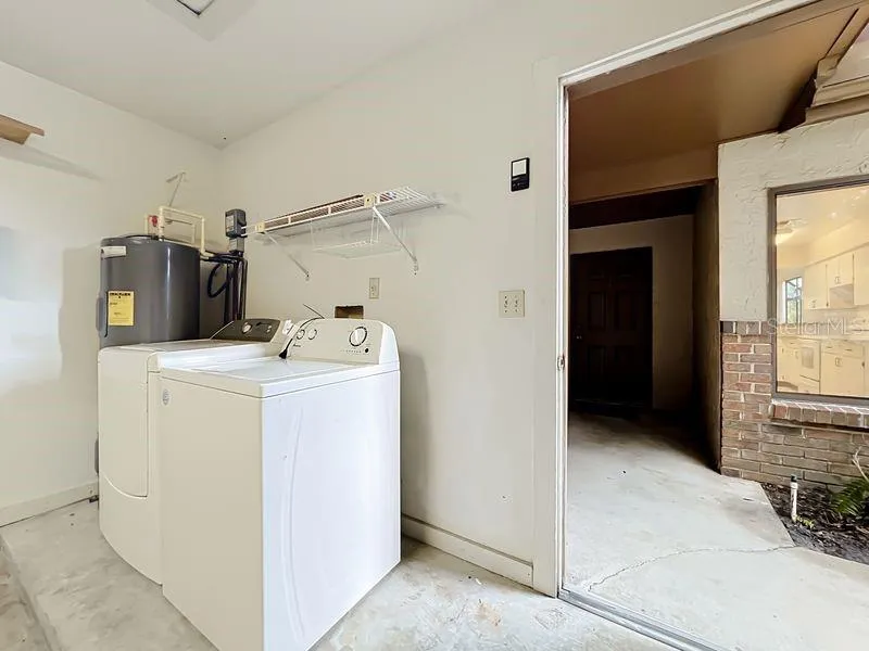 Washer & Dryer Included In Garage