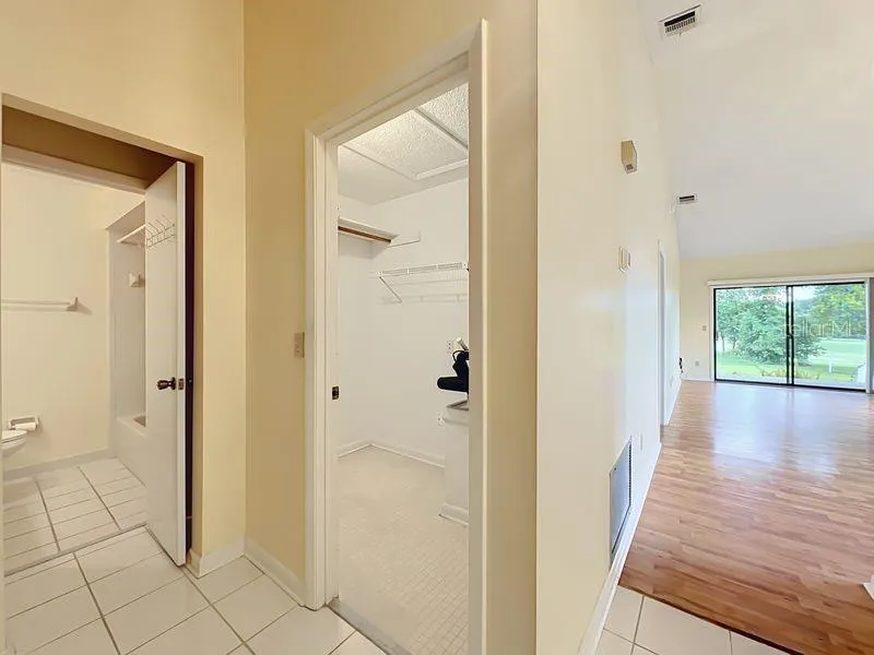 Foyer Showing Guest Bath, Inside Storage & Golf Course View