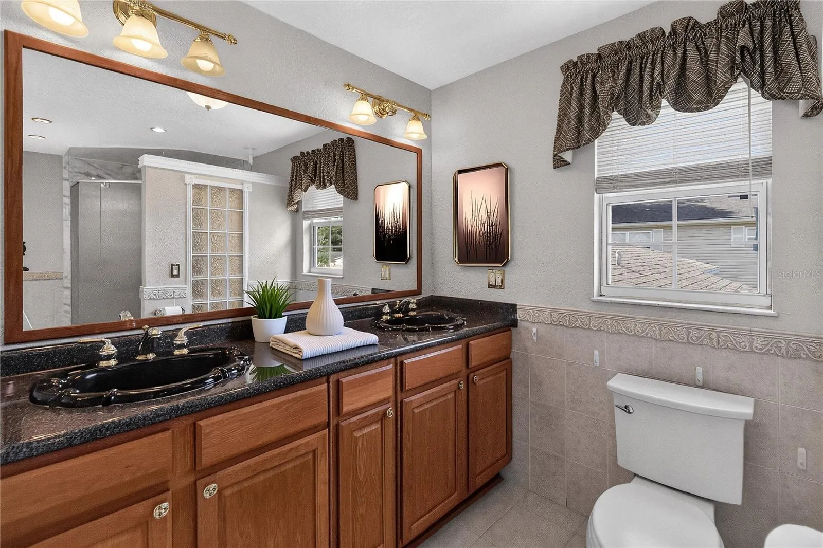 Primary en suite bathroom - spacious with shower and changing area