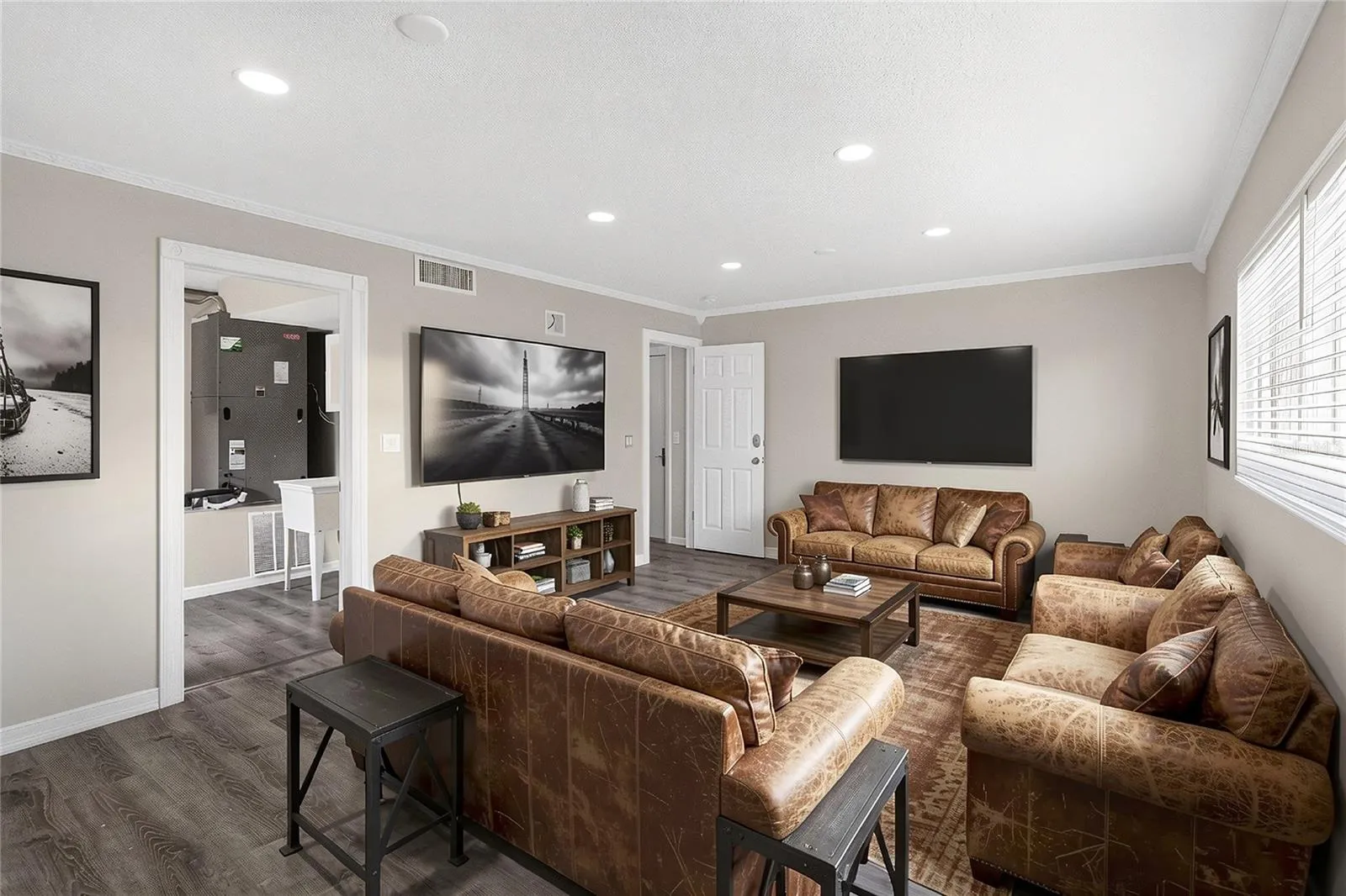 Bedroom #5, (virtual stage)  - Oversized ground floor bedroom offers flexible use — ideal as a guest suite, craft studio, home office, fitness room.  This multi purpose space has GREAT VALUE and not just “another bedroom.”